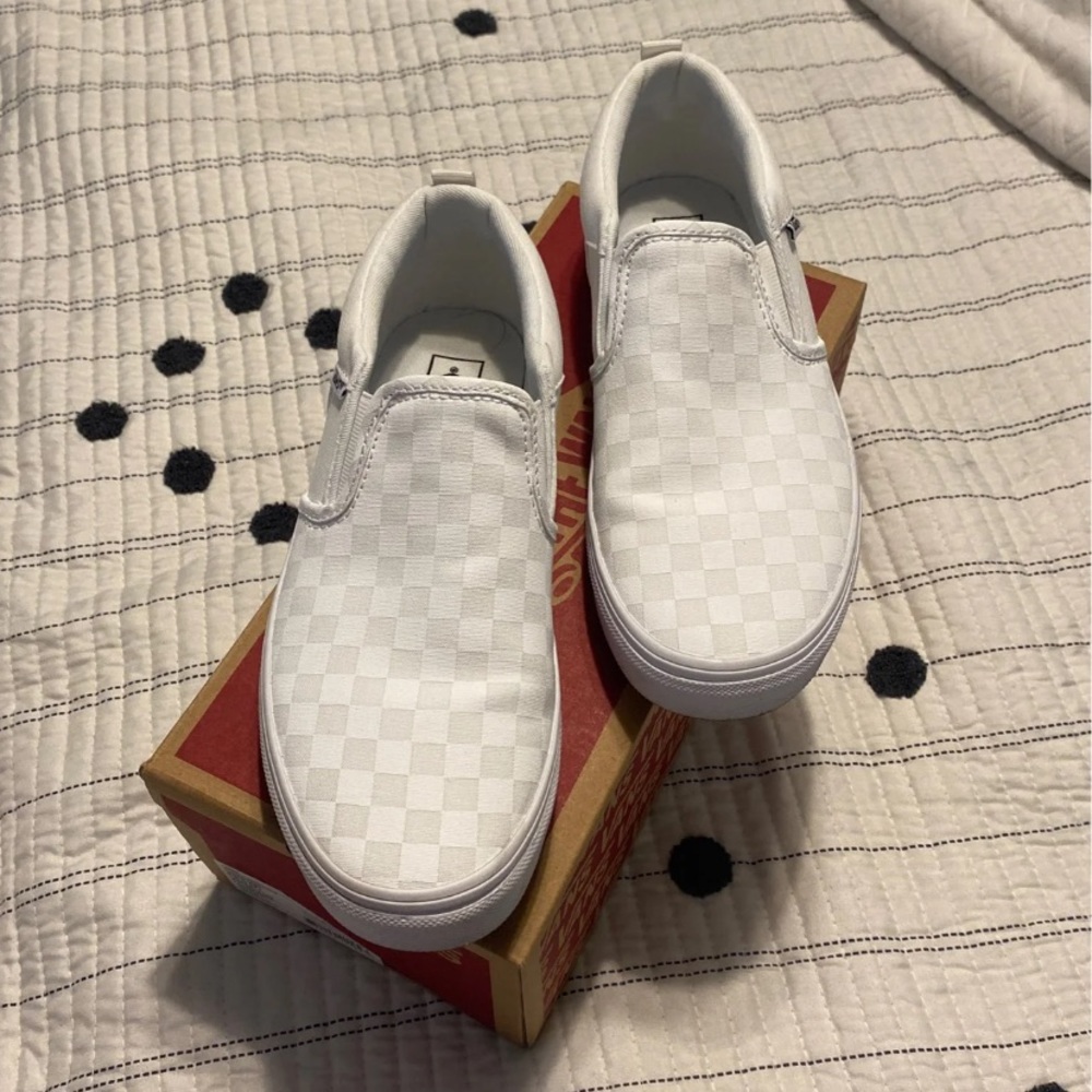 White slip on vans
